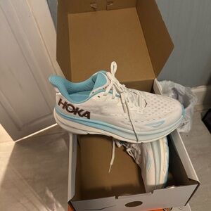 Hoka One One Women's White and Light Blue Running Sneakers with Brown Logo